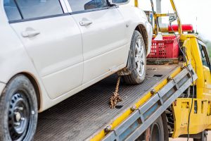 Close-Up Of Damaged Car Towing Outdoors