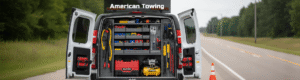 American Towing van parked on roadside with tools in the back